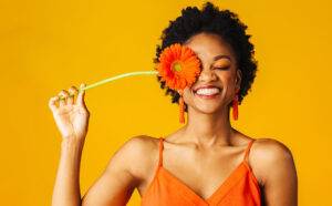 black-woman-smile-flower-skin